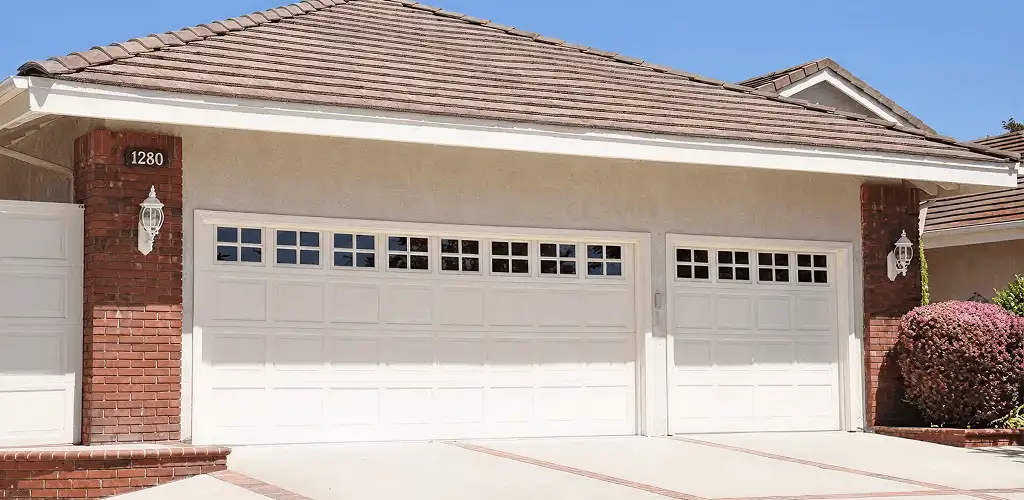 Residential garage door repair service for a double garage door in Little Rock, AR