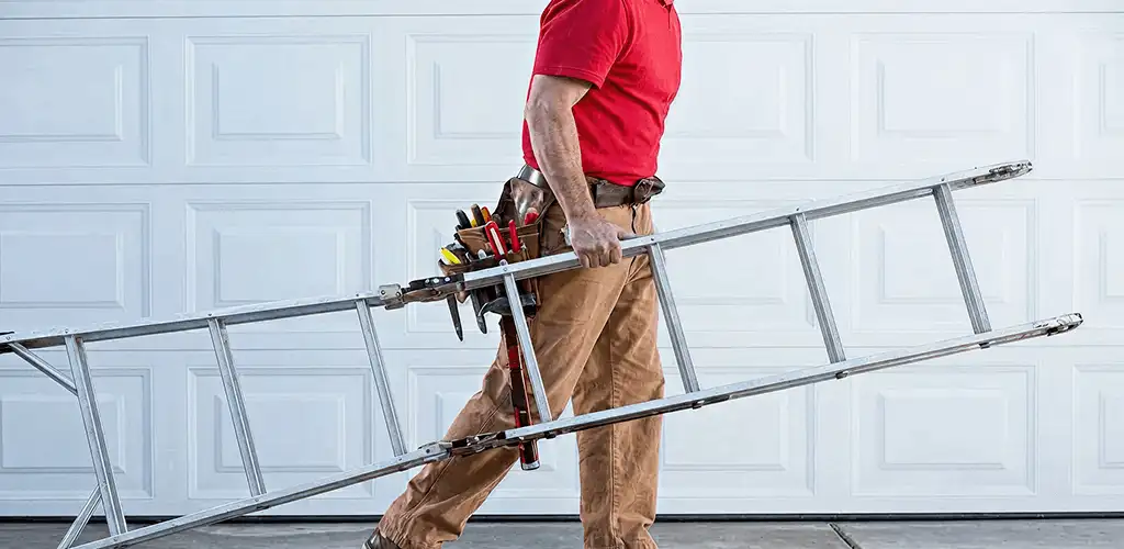 Garage door repair technician arriving with tools and ladder in Little Rock, AR