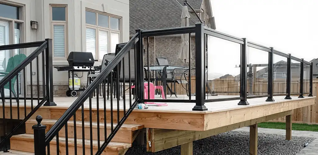 Handrail installation on a deck staircase for safety and code compliance in Little Rock, AR